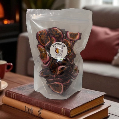 Bag of dried fruit on a stack of books with a cozy living room background