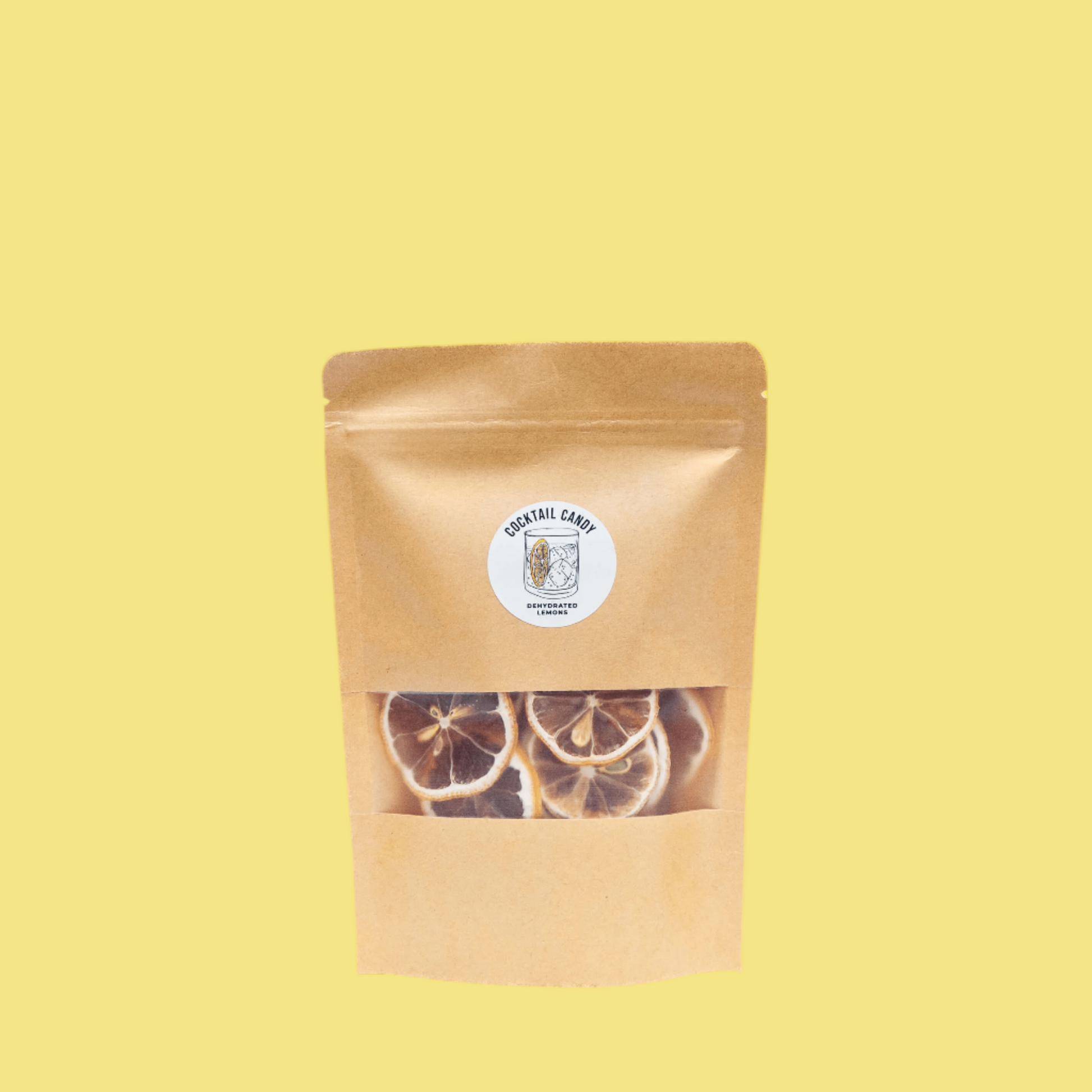 Kraft paper packaging with dried lemon slices on a yellow background