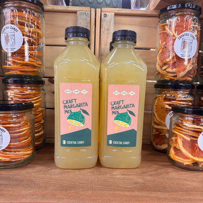 Two bottles of margarita mix