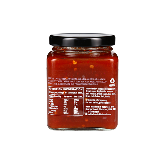 Jar of red sauce with nutrition information label on a white background