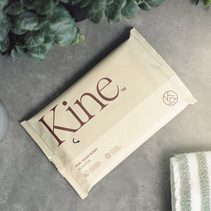 A packaged flushable wipes with the brand name 'Kine' printed on it, indicating it is a eco-friendly product possibly made from plant-based materials.