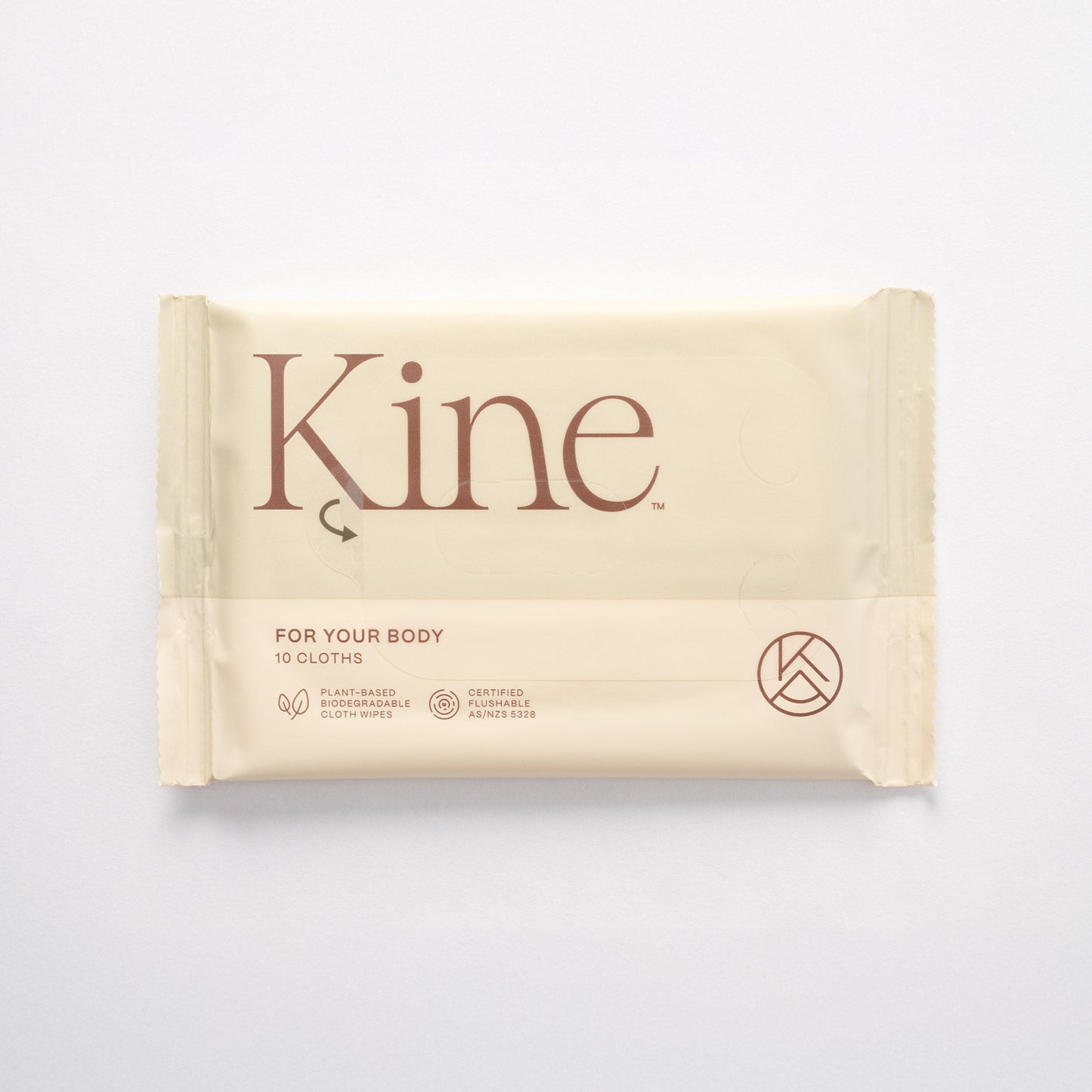 A packaged flushable wipes with the brand name 'Kine' printed on it, indicating it is a eco-friendly product possibly made from plant-based materials. Flushable wipes Australia. Travel wet wipes