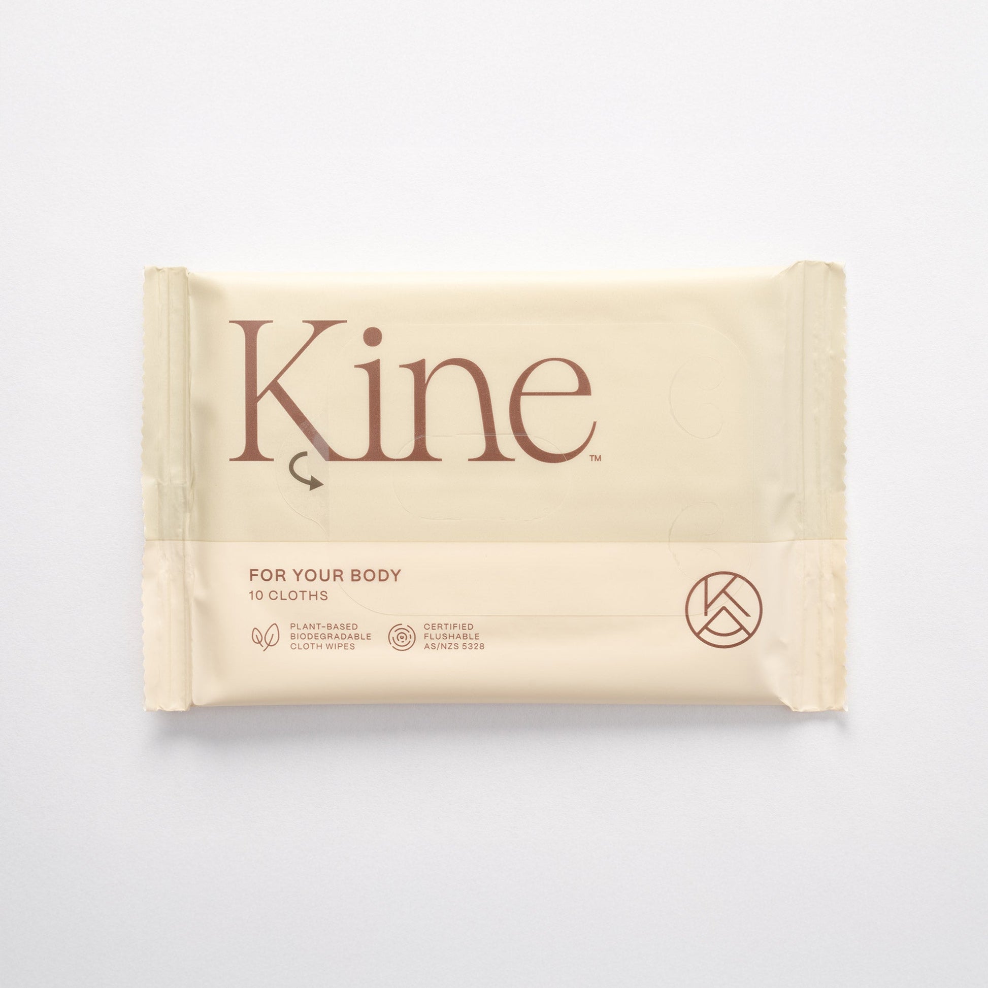 A packaged flushable wipes with the brand name 'Kine' printed on it, indicating it is a eco-friendly product possibly made from plant-based materials. Flushable wipes Australia. Travel wet wipes