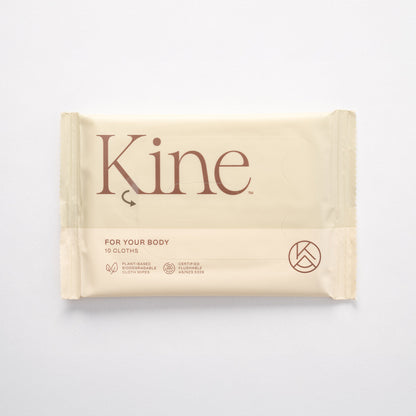 A packaged flushable wipes with the brand name 'Kine' printed on it, indicating it is a eco-friendly product possibly made from plant-based materials. Flushable wipes Australia. Travel wet wipes