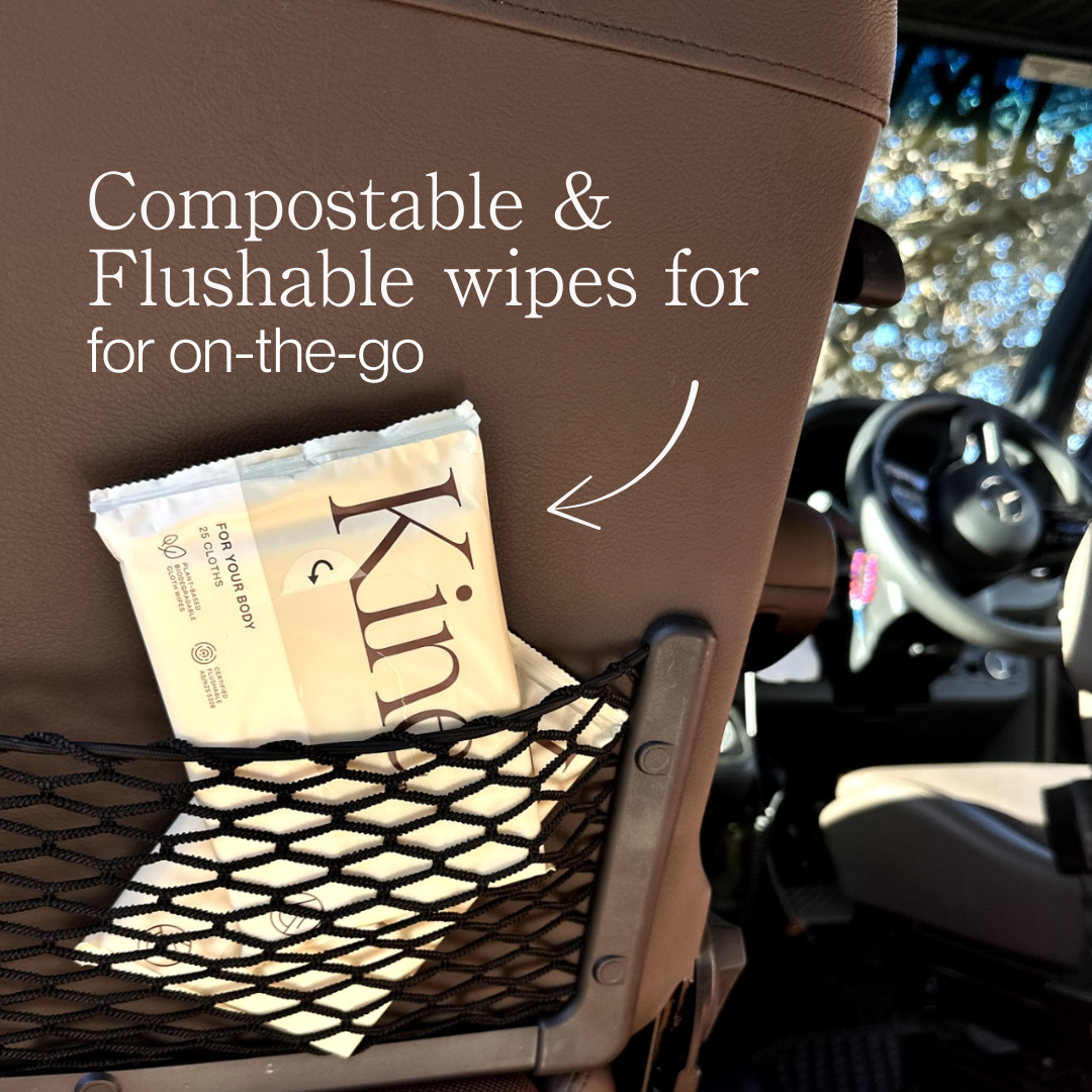 Kine compostable and flushable wipes package in a car's netted storage area.Travel wet wipes, travel wipes flushable, on-the-go wipes, certified flushable AS/NZS 5328. Travel wet wipes