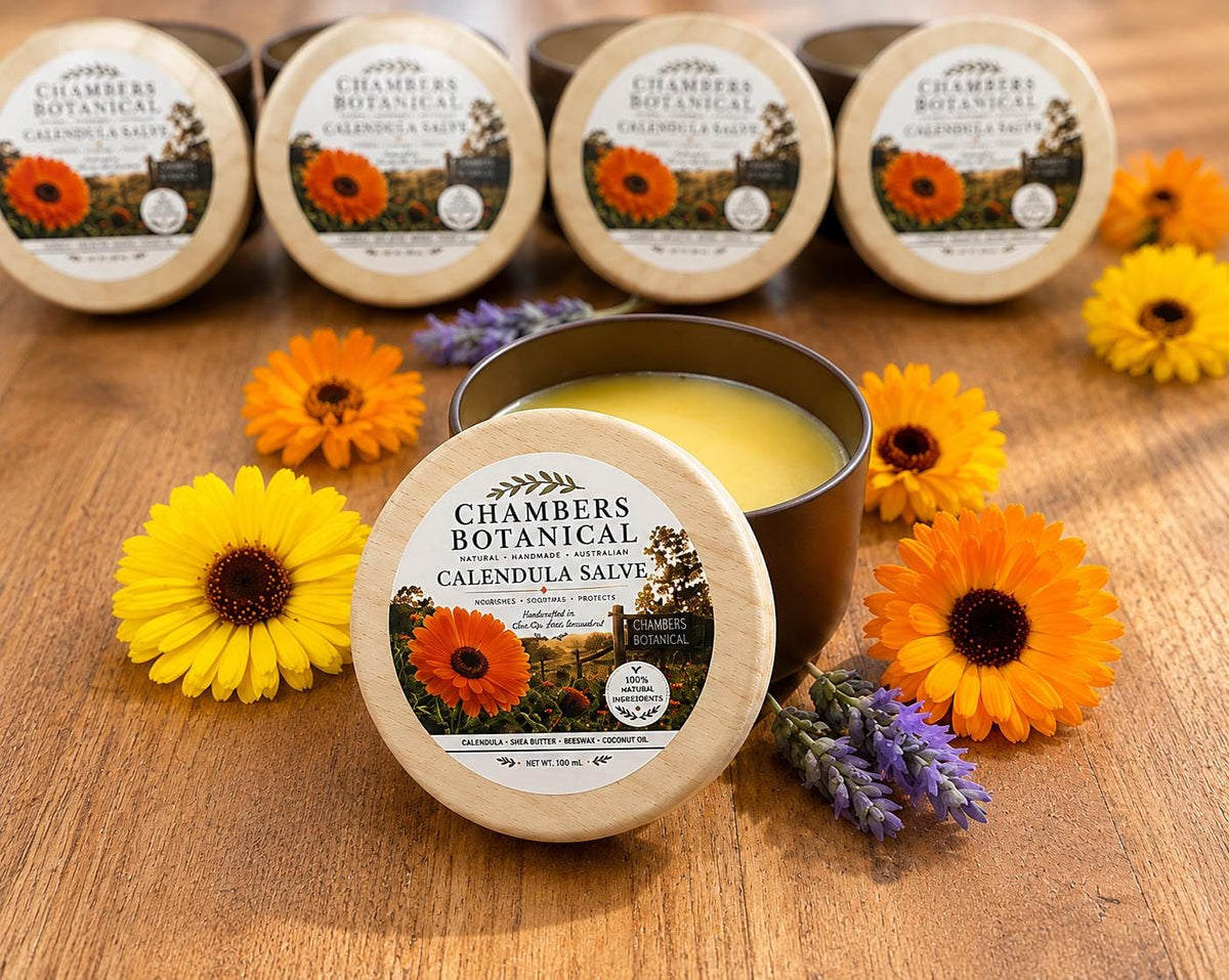 Chambers Botanical Calendula Skin Balm open jar showing the balm