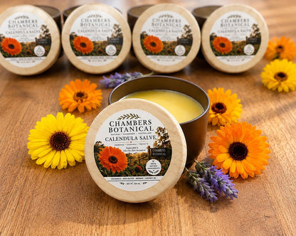 Chambers Botanical Calendula Skin Balm open jar showing the balm
