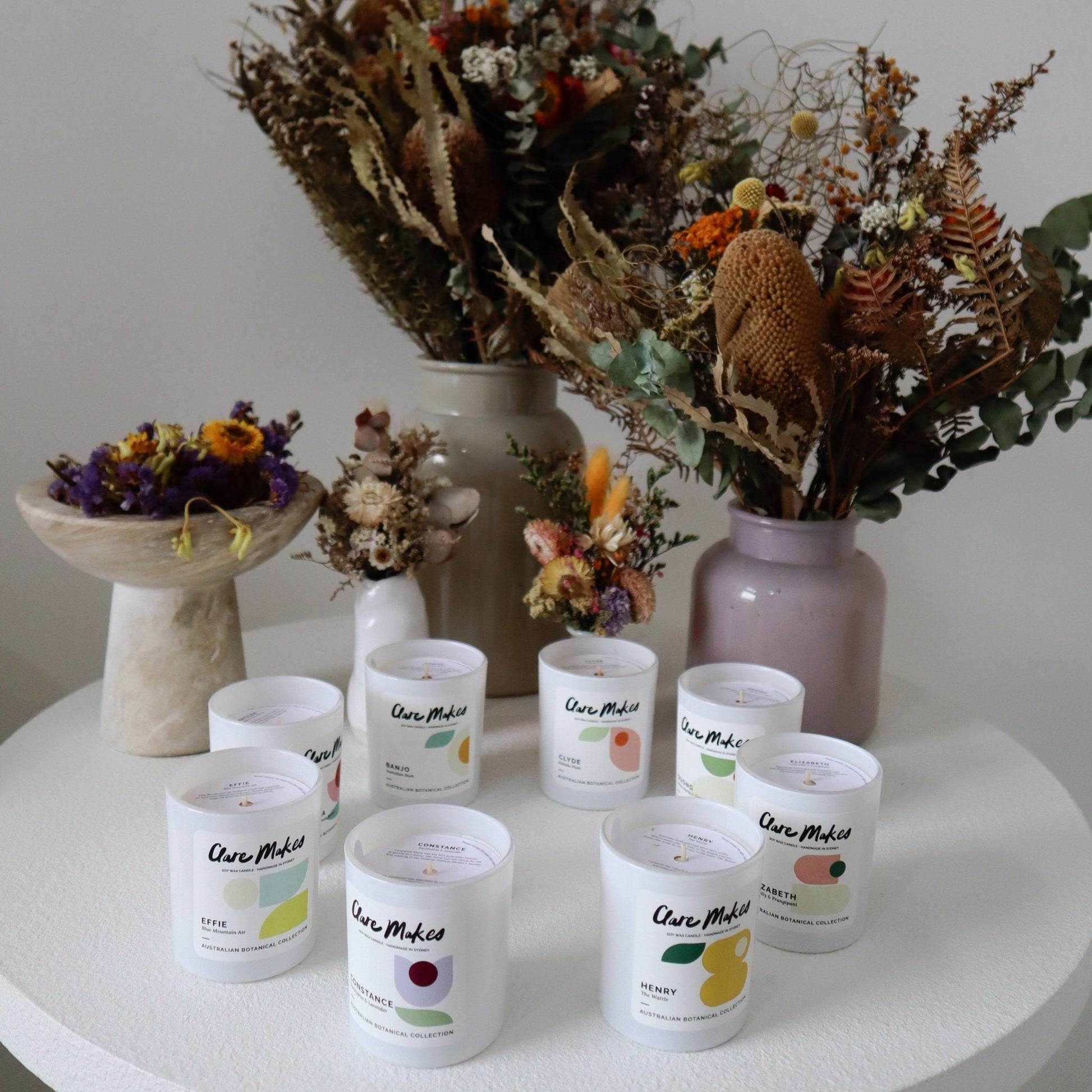 Medium Soy Wax Candles 180g by Clare Makes in white jars with Australian native botanicals